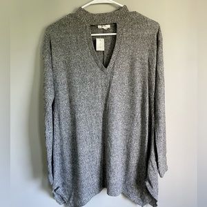 Cut-out long sleeve top, new with tags